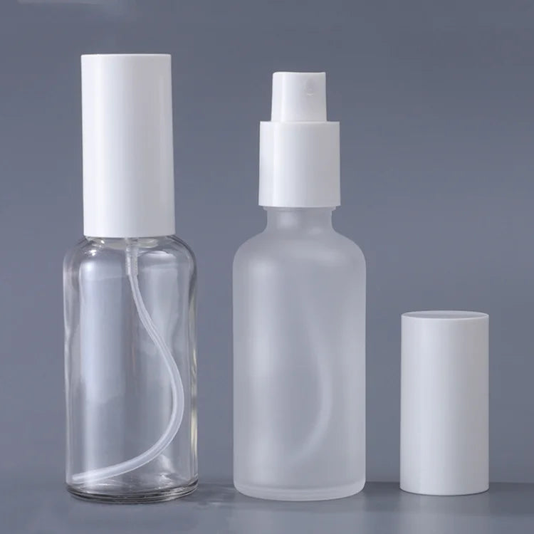 Empty Cosmetic Bottle Supplier 20ml 30ml 50ml 100ml Plastic White Pump Spray Glass Essential Oil Bottle