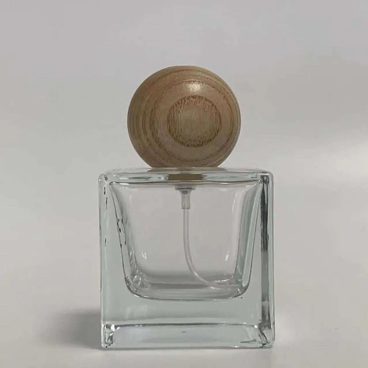 High Quality Luxury Square Glass Perfume Bottles 30ML 50ML 100ML with Wood for Ball Cap and Pump Sprayer Hot Selling
