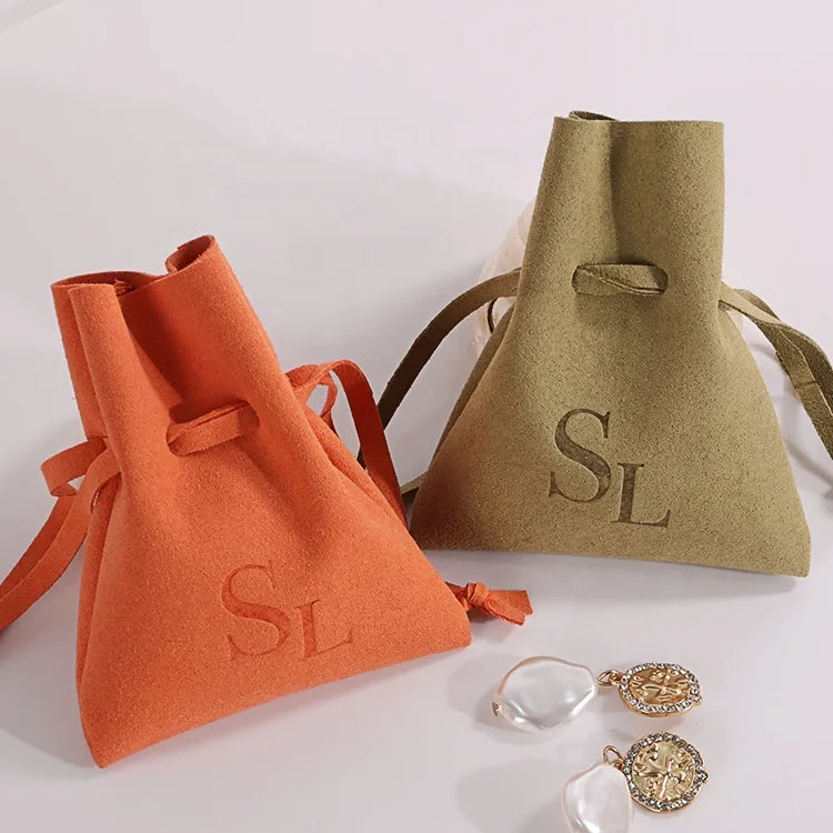 Chuanghua Custom Velvet Drawstring Pouch Bag Microfiber Fabric Deboss Print Soft Drawstring Jewelry Bag Orange Packaging Pouch