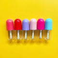 L-Zhuang Low MOQ 100pieces Popular Red Purple Pink Blue Wholesale No Logo 4ml Mini Cute Mini Capsule Lipgloss Tubes