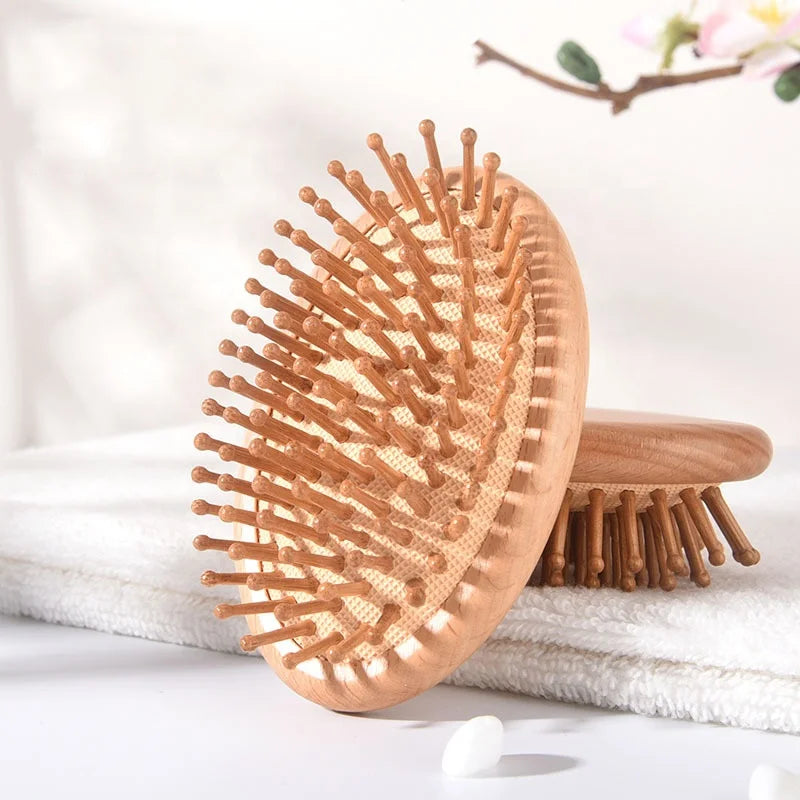 2026 New Arrival 100% Natural Oval Massage Travel Hair Brush with Paddle Vent Design Easy Carry Custom Logo Private Label Comb