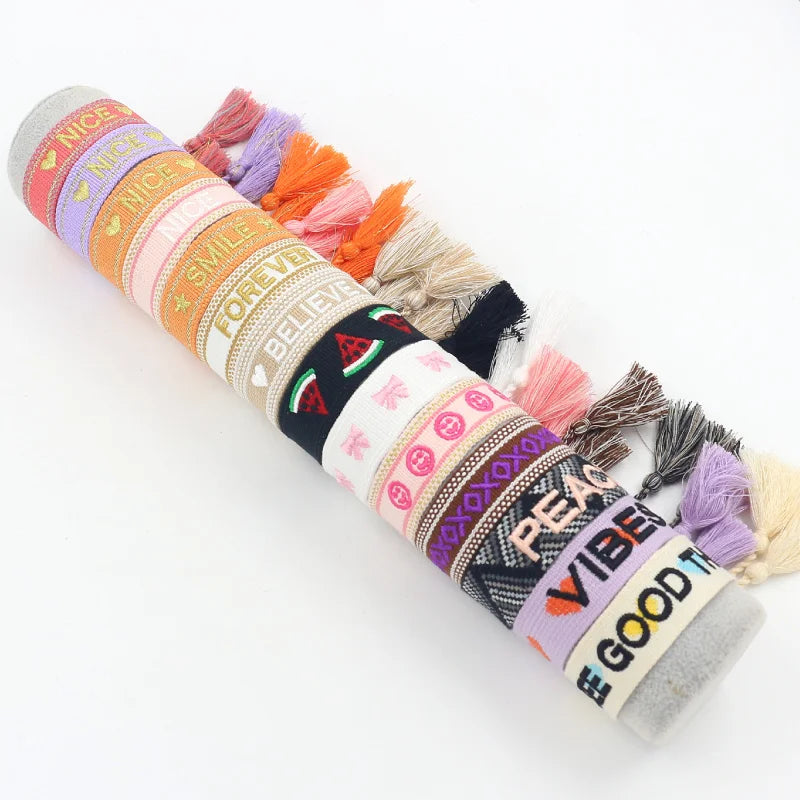 Stock Wholesale Ethnic Style Colorful Webbing Embroidered Text Pattern Woven Wrist Strap Tassel Friendship Bracelet