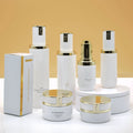 Luxury White Cosmetics Packaging Sets Empty Glass Cream Jar and Pump Spray Bottle Skin Care Set Face Cream Lotion Bottle