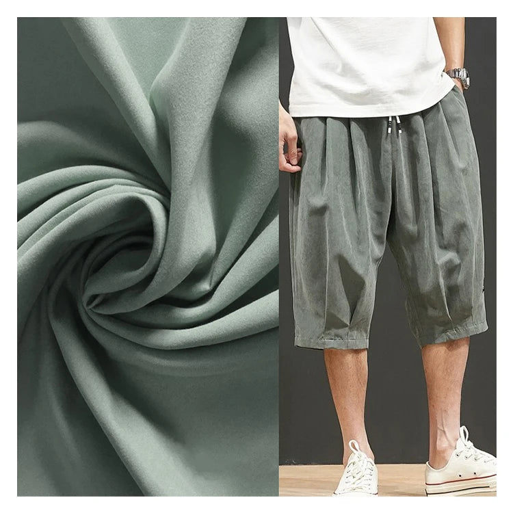 Factory Direct Sale 75D*150D Peachskin Fabric Free Sample Outdoor Casual Pants Fabric Polyester Peach Skin Fabric