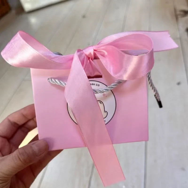 Wholesale Custom Logo Printing Light Deep Pink Paper Gift Bag With Uv Glossy Gold for Clothing Shoes Accessories With Ribbon