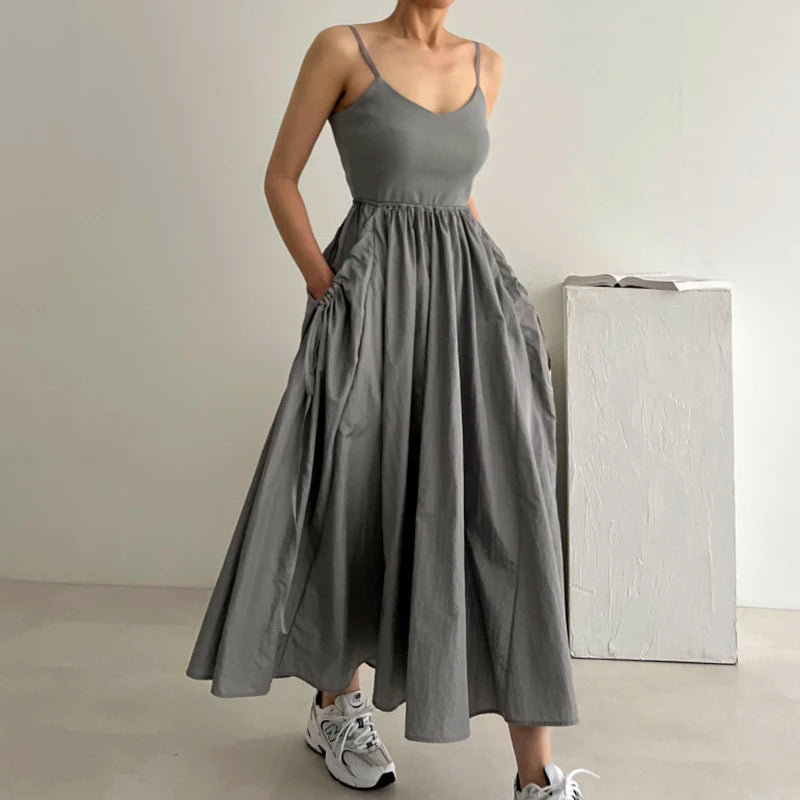 Wholesale 2026 Summer Niche V-neck Off Shoulder Pleated Waist Slimming Large Swing Sleeveless Suspender Women's Dress