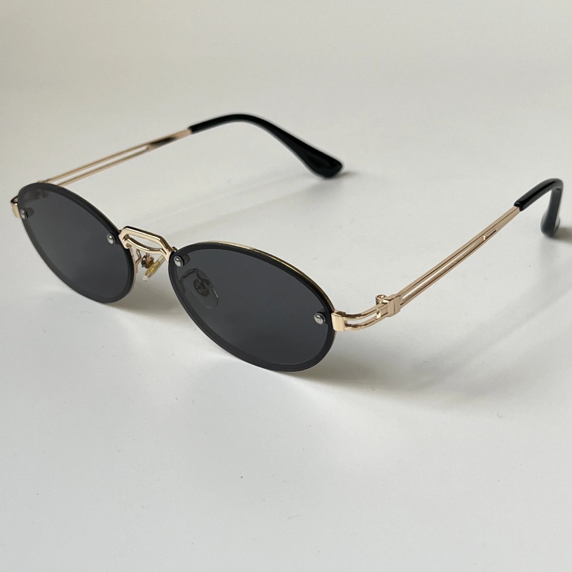 New Arrivals Punk Style Sun Glasses Unisex Cool Oval Frame Trend Thin Rimless Sunglasses for Women