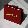 Luxury Custom Logo Printed Hot Stamping Laser Bright Gold Quality Gift Packaging Pink Ribbon Shopping Paper Bag for Cosmetic Bag