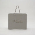 Customized Embossed Logo Quality Packaging Gift Women Paper Shopping Cosmetic Bag Wholesale Fashion Small Bags with Handles