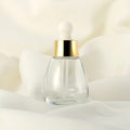 2024 New Arrival 1 oz 30mlGlass Bottle with Dropper Bulb Shape Design Gold Ring White Rubber Head Essential Oil Container