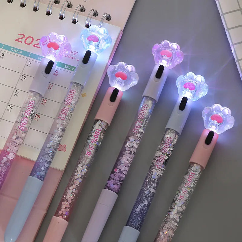 Hot Sale Cute Liquid Foil Metal Ball Pens Cat Paw Shiny Luminous Ballpoint Pens Stationery School Supplies Floating Glitter Pen