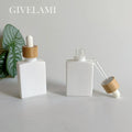 Cosmetic Container 15ml 30ml 50ml 100ml Square Matte White Glass Essential Oil Dropper Bottle With Bamboo Wooden Lids