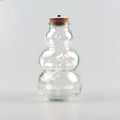 Home Decorative Shinning Glass Bottle with Snowman Design Clear Bottle with Cork Sealing