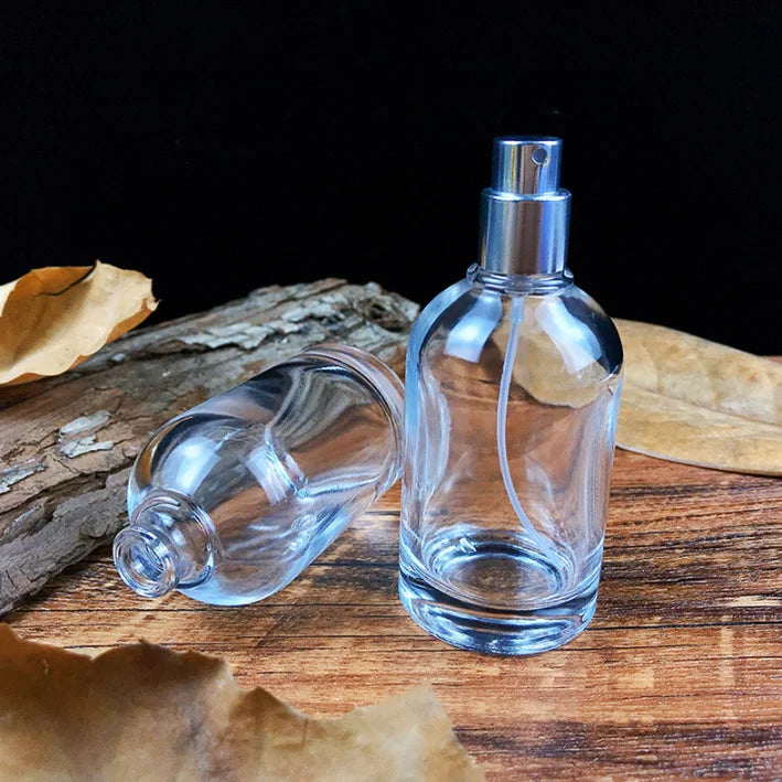 Wholesale Spray 50ml Round Empty Transparent Cylindrical Refillable Glass Perfume Spray Bottle