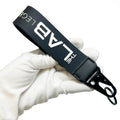 Wholesale Custom Design Pvc Key Chain Rubber Wrist Strap Off Keychain Lanyard Keychain for Clothes