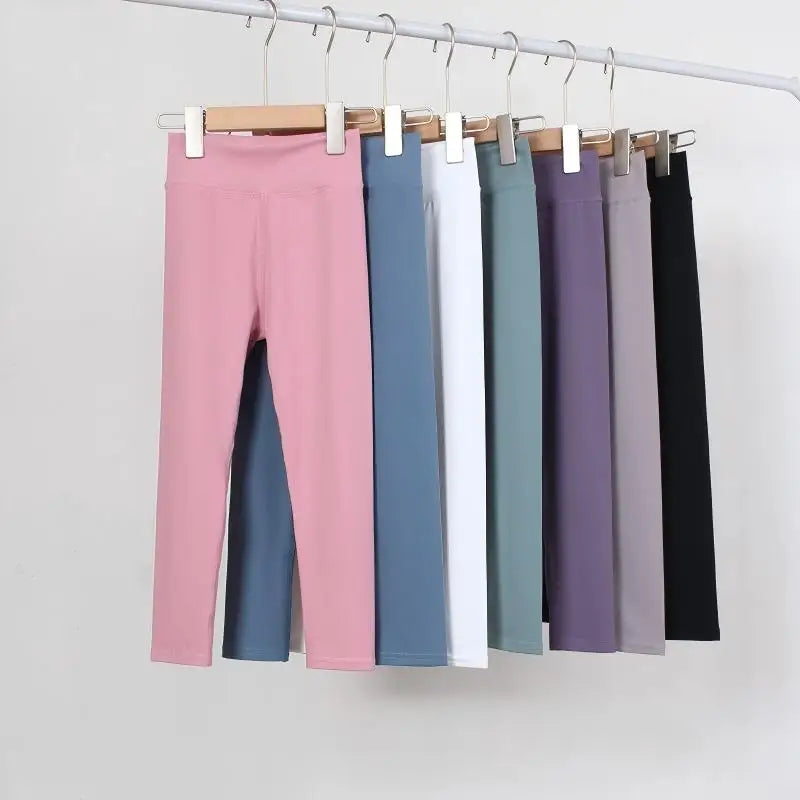Butt Lifting Breathable Quick Dry Yoga Pants Sports Wear for Kids Custom Seamless High Waist Solid Color Leggings Manufacturer