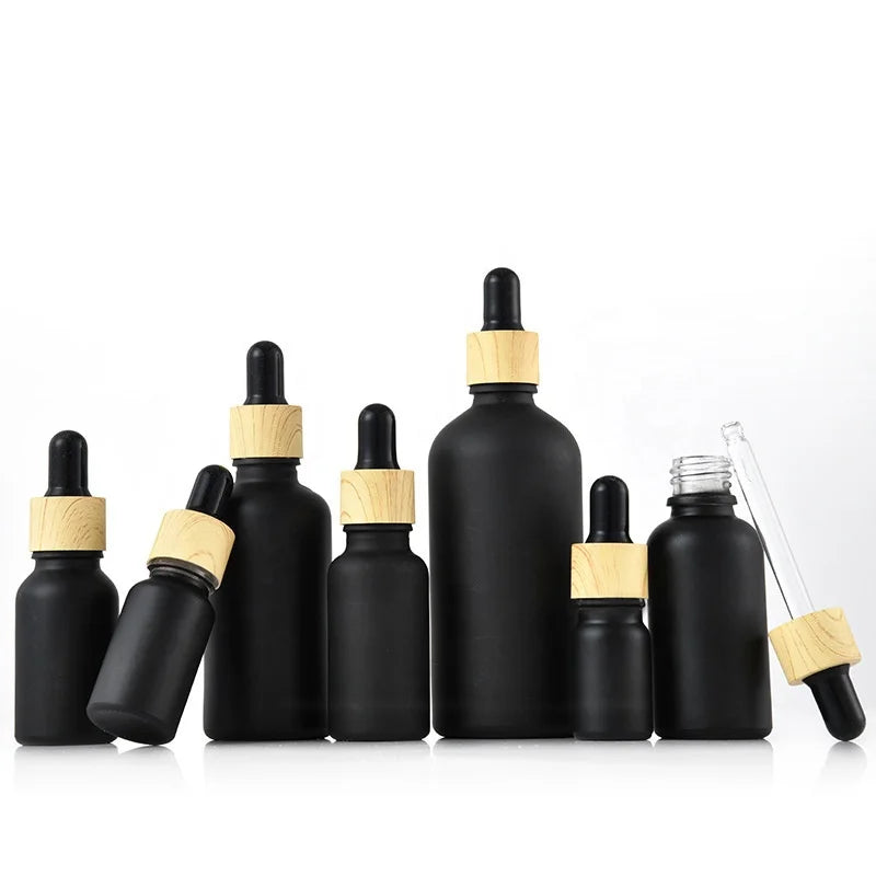 Matte Black 30ml 1oz Glass Dropper Bottle Boston Round Essential Oils Eye Drop Container with Wood Grain Plastic Cap