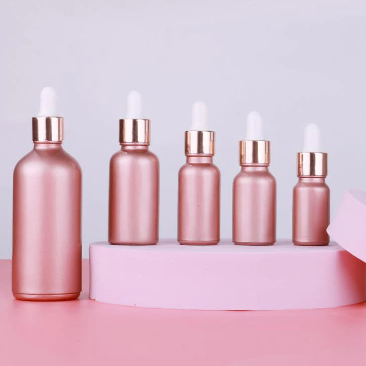 Cheap Cosmetic Face Skincare Serum Essential Oil Packaging Empty Rose Gold Color 1oz Frosted Glass Dropper Bottle