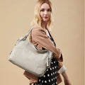 Asymmetric Stitching Top-Grain Leather Tote Vintage Slouchy Hobo Bag Peach Grain Leather Tote Handbag for Women Tassel Charm