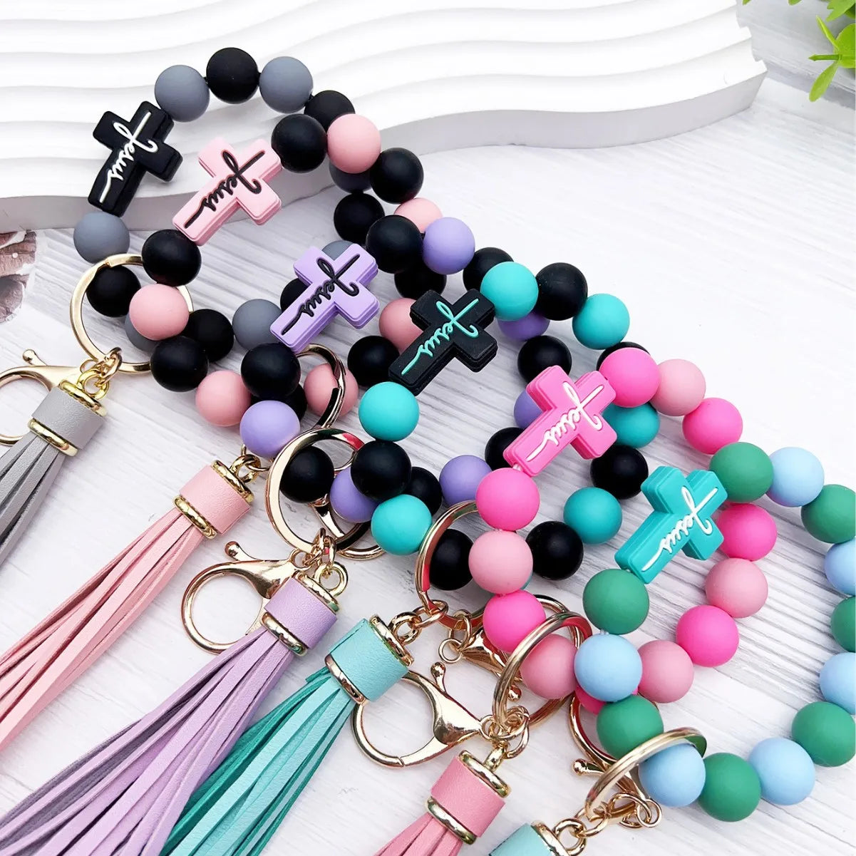 Wholesale Custom Beaded Keychain Luxury Lobster Clasp Silicone Cross Beads Bracelet Wrist Keychain With Tassel