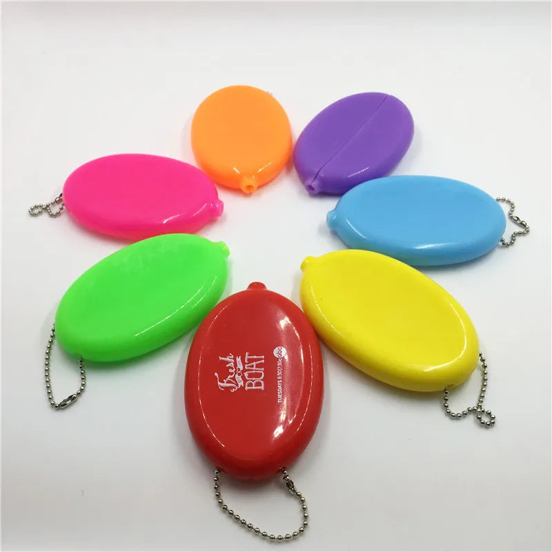 Custom Logo Oval PVC Squeeze Coin Holder Japan Hot -selling Rubber Coin Case Advertising Coin Purse Keychain