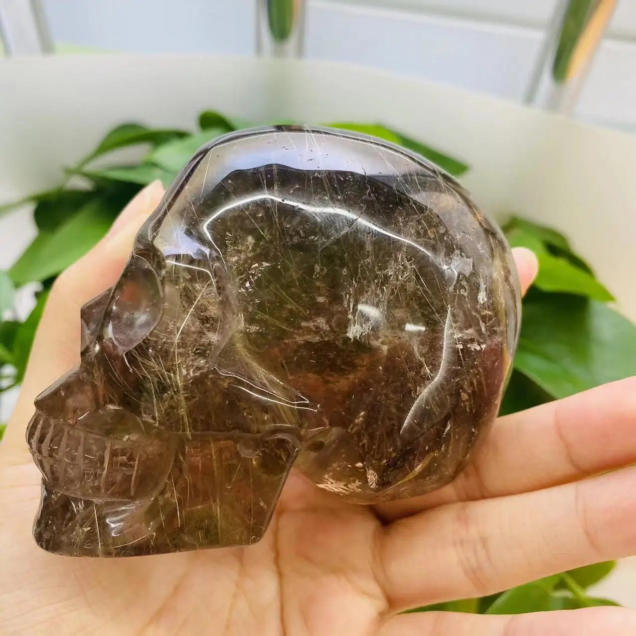 Factory Outlet Wholesale Hot Selling Crystal Skulls Hand Carved Smoky Quartz with Gold Rutilated Quartz Skulls for Fengshui