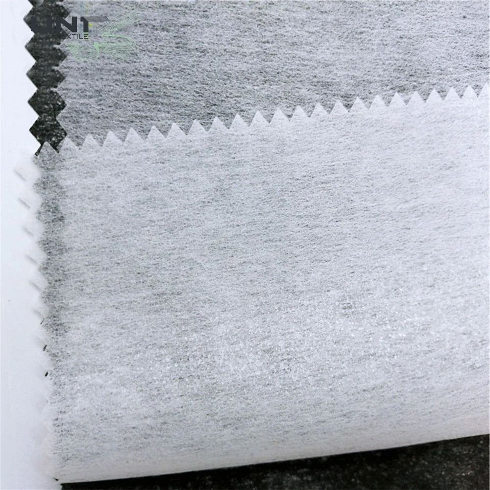 Made in China Wholesale Eco-friendly Degradable Fusible Fabric Non Woven Fusing Nonwoven Interlining for Garment Overcoat