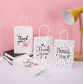 2022 Factory Direct Custom Gift Packaging Paper Bag with Your Own logo Business Paper Bag Paper Printing Bag Birthday