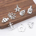 In Stock Small Stainless Steel Charm Marine-Themed Flower Starfish Astronaut Anchor Conch Pendant Jewelry Findings & Components
