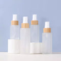 Custom logo Matte Frosted Empty Cylinder Round Flat Shoulder Cosmetic Package Bamboo Lid Glass Perfume Spray Bottle 120ml