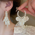 Romantic Beautiful Female Hoop Earrings with French Pearl Petal CE Manguito De Oreja Shell Tassel Drop Fashion Style