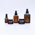 Wholesale Borosilicate Glass Cosmetic Bottles Set Clear Color Inclined Shoulder Design Dropper Cap Customizable Skin Care Cream