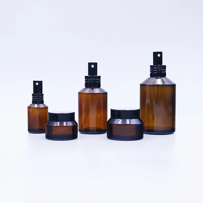Wholesale Borosilicate Glass Cosmetic Bottles Set Clear Color Inclined Shoulder Design Dropper Cap Customizable Skin Care Cream