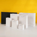 Wholesale Luxury Small White Paper Recyclable Handle Bags for Gift Jewelry & Watch Packaging