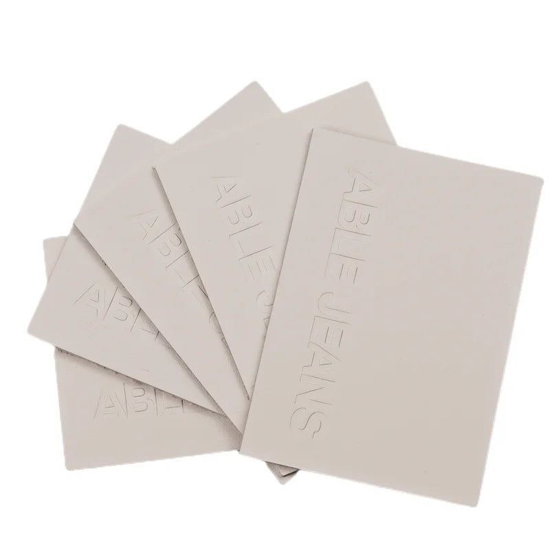 Logo Design Stylish Garment Leather Labels for Oversized Jeans PU Leather Patches Roll Shape Eco-Friendly Washable