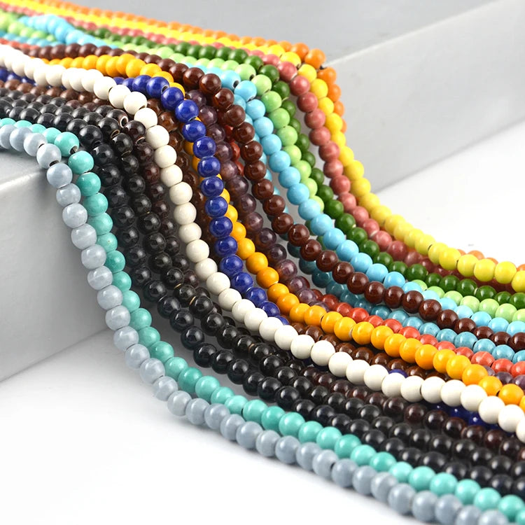 Wholesale China 10mm Single Color Clay Gemstone Round Ceramic Insulation Beads