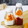 Hot Selling Anti-Theft Lid Split Glass Bottle 10oz and 16oz for Fresh Milk Beverage Juice Tea Food Storage Container