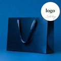 Wholesale Luxury Paper Bag Cosmetic Shopping Gift Solid Color Bag Custom Printed Logo With Silk Ribbon Handles