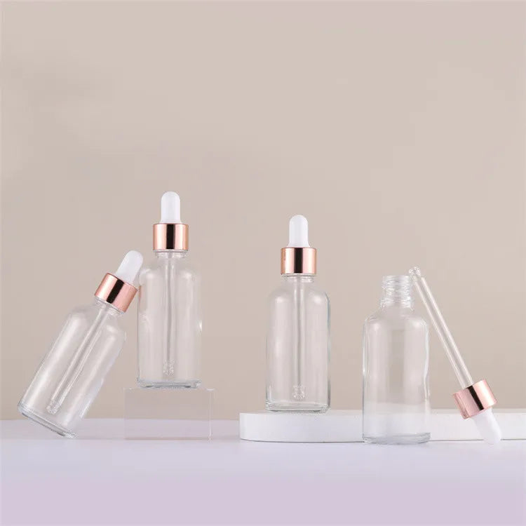 Best Selling Rose Gold Cap 1oz 2oz 4oz clear Glass Essential Oil Dropper Bottles for Oil in Stock