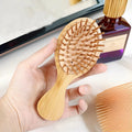 Factory Wholesale Custom Logo Eco-Friendly Mini Airbag Pocket Hair Comb Portable Natural Bamboo Hair Tool for Children's Massage