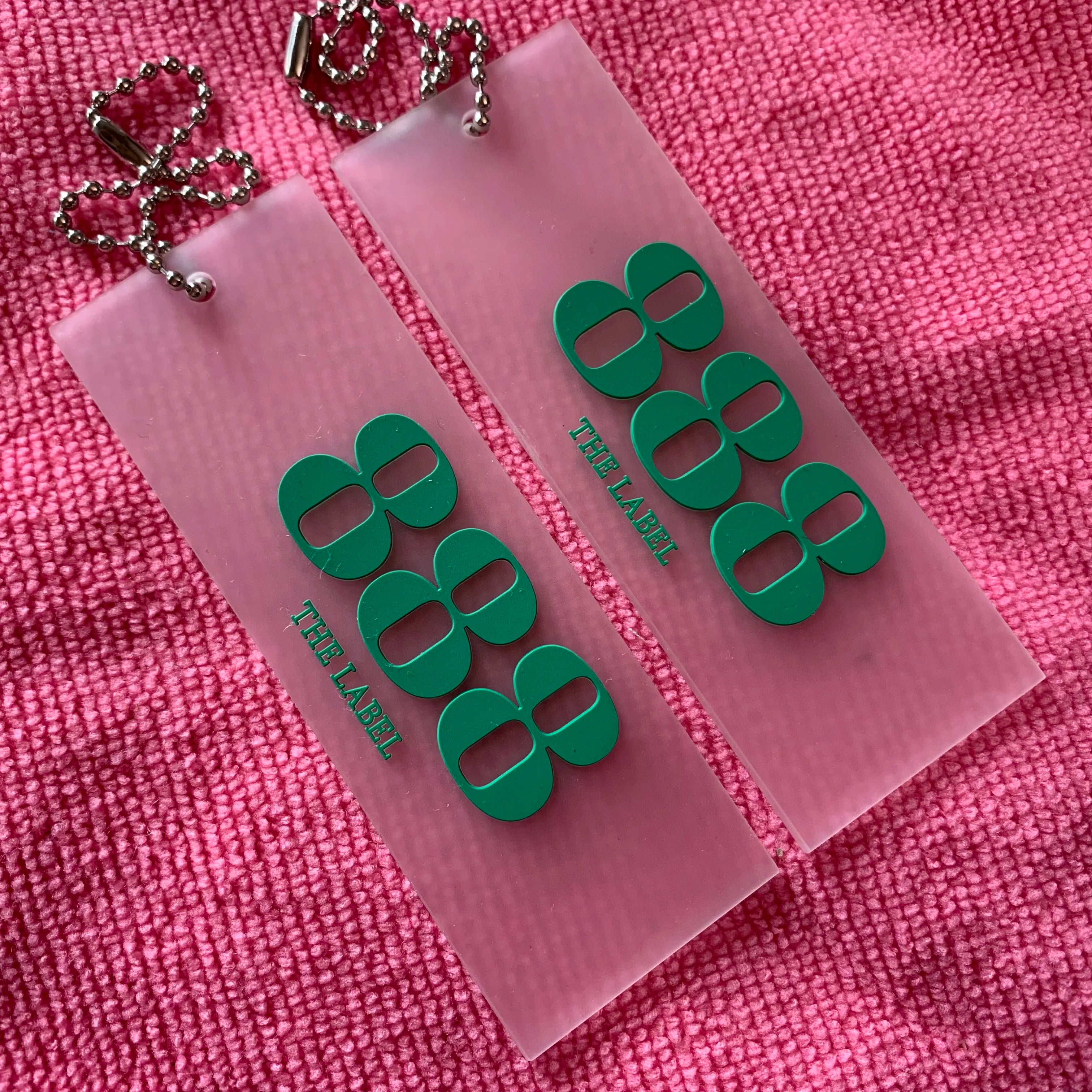 Newest Design 3D Raised logo Transparent PVC Rubber Hangtag for Suitswaterproof Private logo Silicone Rubber hang Tag