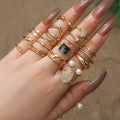 21pcs /set Fashion Pearl Carved Buddha Statue Ring Crescent Hollow Cross Drip Oil Black Ring for Women Rhinestone Ring Set