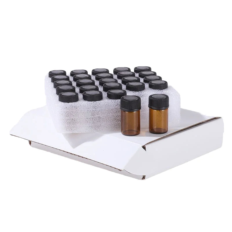 Guangzhou Wholesale 1ml 2ml Brown Glass Essence Oil Mini Small Test Pack Round Shape Dropper Sealing Screen Printing Surface