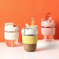 FX Factory Lovely Glass Water Bottle High Borosilicate BPA FREE Portable Drinking Bottle Screw-On Straw Cap Silicone Sleeve
