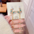 SP S925 Silver Needle High Quality Pearl Long Tassel Butterfly Earrings