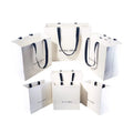 Custom Your Own Logo Printed Luxury Gift Packaging Paper Retail Store Shopping Paper Bag Ribbon Handle