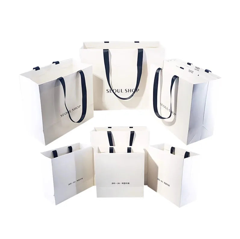 Custom Your Own Logo Printed Luxury Gift Packaging Paper Retail Store Shopping Paper Bag Ribbon Handle