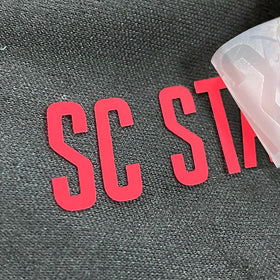 T Shirt Custom Embossed Iron on Soft Rubber PVC Garment Label Rubber Patch Clothing Clothes Rubber Logo 3D Silicone PVC Logo