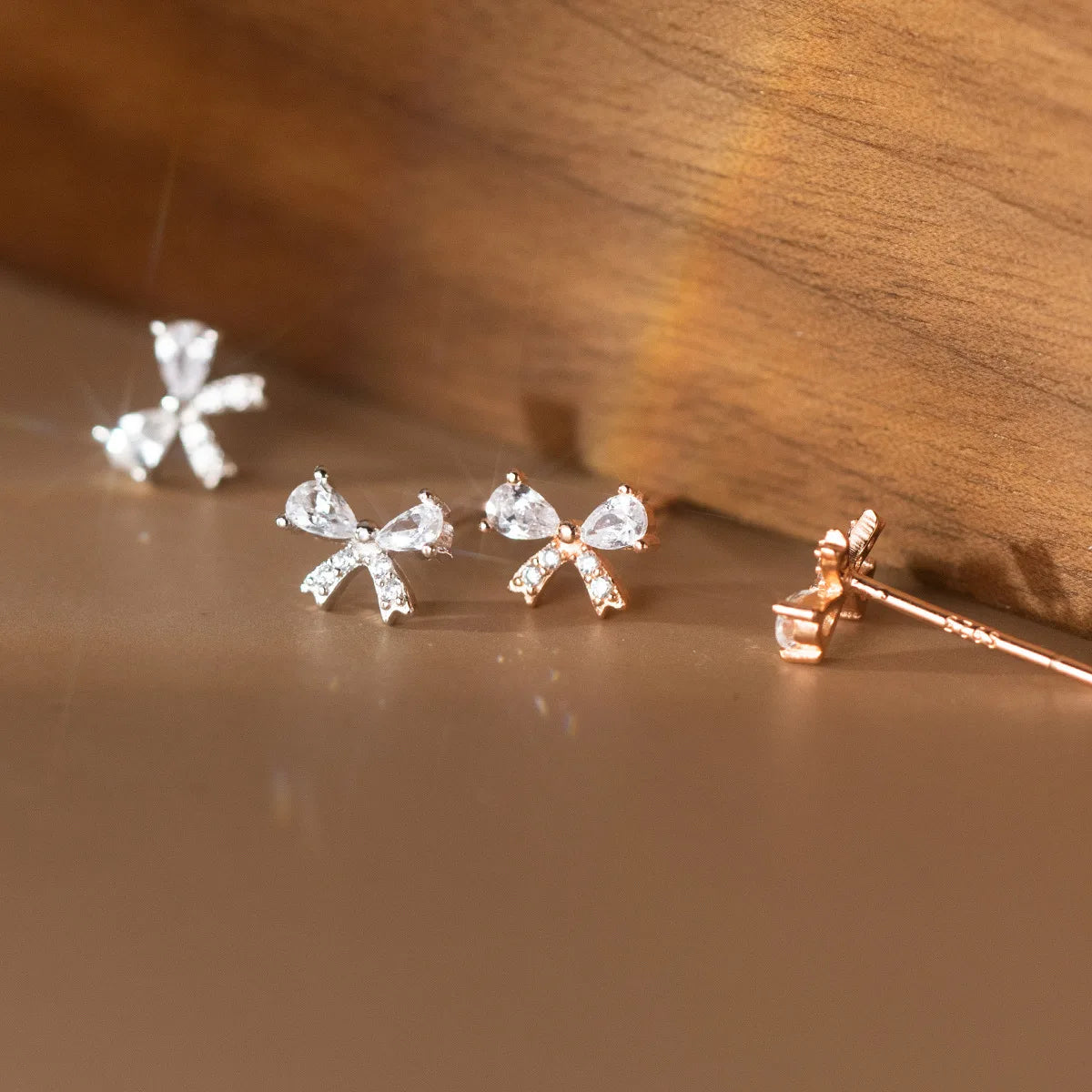 New Unique Design S925 Sterling Silver CZ Bowknot Charm Stud Earrings for Women M03039