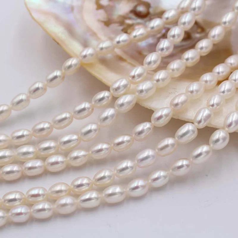 Factory Wholesale 100% Natural Freshwater Pearl Chain 3-10mm4A Rice Shaped Pearls in White Pink Purple Colors Fashion Jewelry